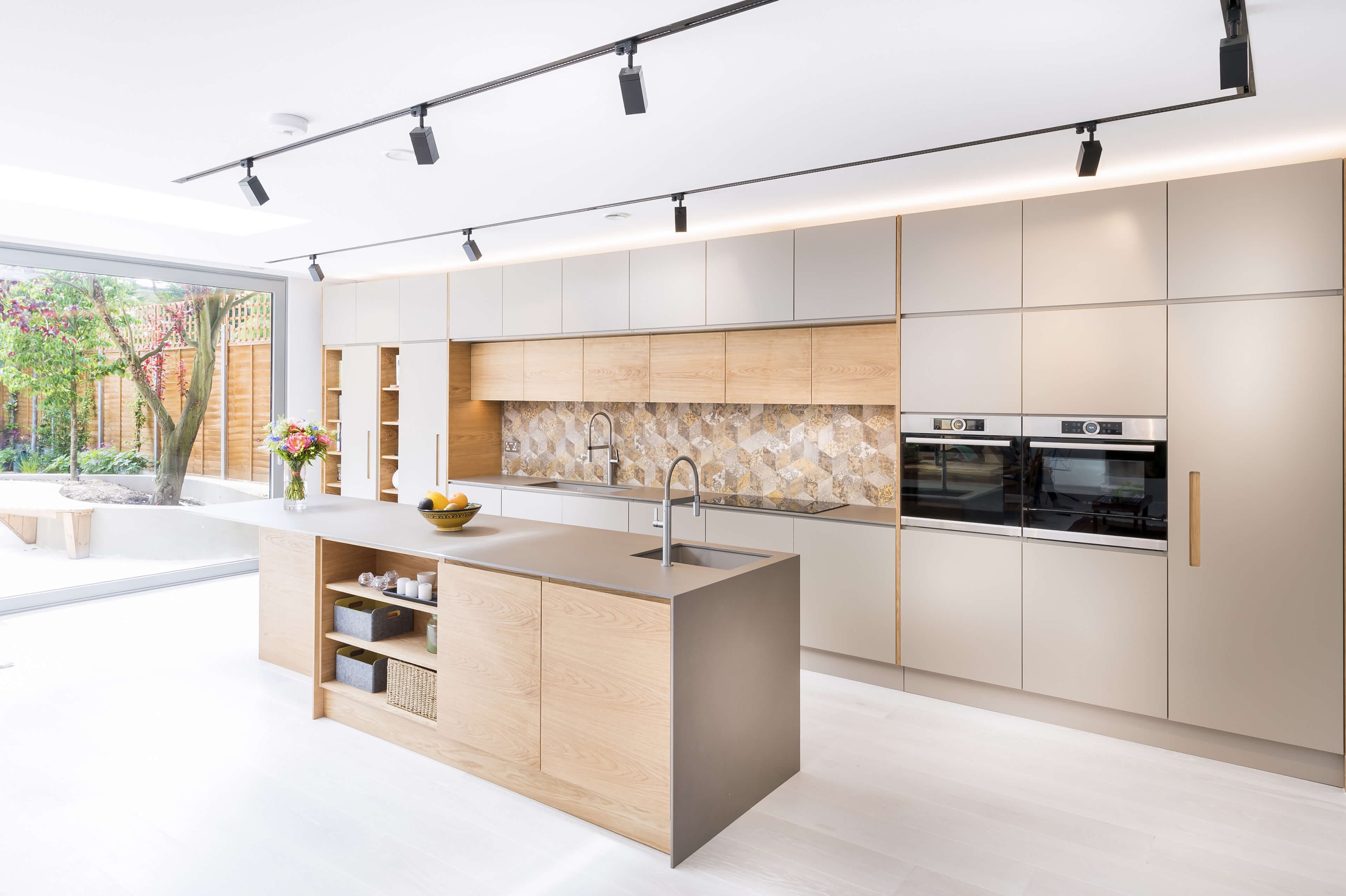 Soft-grain maple in warm natural — the wood does the work.